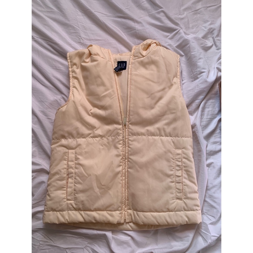 Cream colored vest